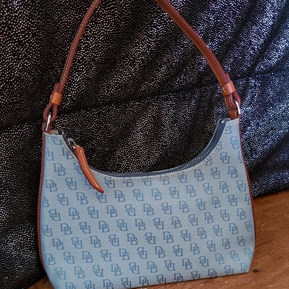 Light Blue mini Dooney & Bourke bag.